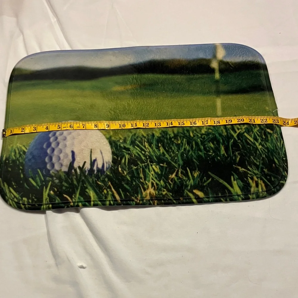 Golf Ball and Green Grass Mat